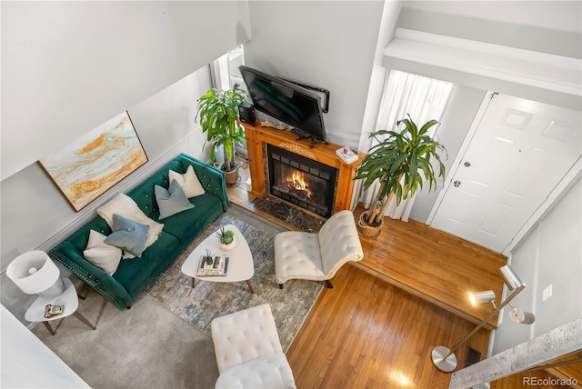 5155 W 68th Ave Unit 5, Westminster, CO 80030 - living room with wood finished floors and a high end fireplace