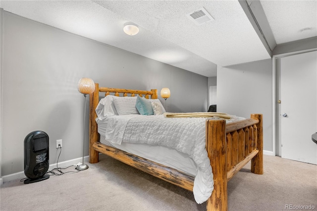 5155 W 68th Ave Unit 5, Westminster, CO 80030 - bedroom with carpet floors, baseboards, and a textured ceiling