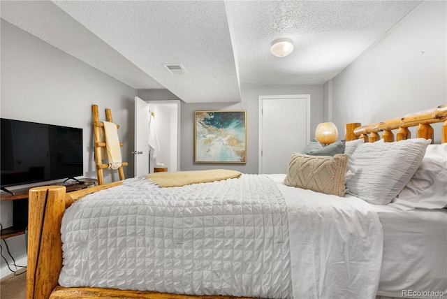 5155 W 68th Ave Unit 5, Westminster, CO 80030 - bedroom with a textured ceiling