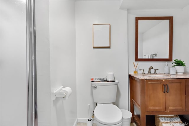 5155 W 68th Ave Unit 5, Westminster, CO 80030 - half bath with toilet, vanity, and baseboards
