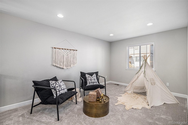 1011 White Leaf Cir, Castle Rock, CO 80108 - living area featuring carpet, baseboards, and recessed lighting