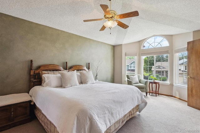 7354 S Robb St, Littleton, CO 80127 - carpeted bedroom featuring vaulted ceiling, a textured ceiling, ceiling fan, and baseboards