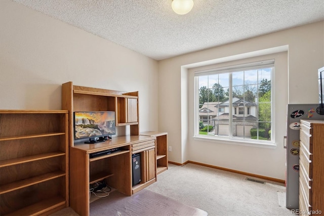 7354 S Robb St, Littleton, CO 80127 - office area featuring carpet floors, a textured ceiling, and baseboards
