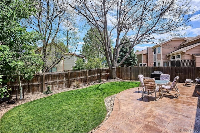 7354 S Robb St, Littleton, CO 80127 - view of yard with outdoor dining area and a patio area