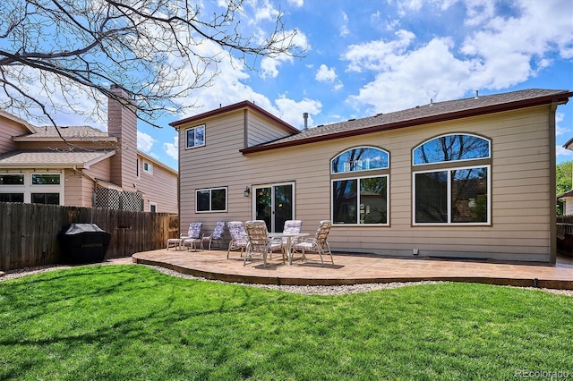 7354 S Robb St, Littleton, CO 80127 - back of property with a patio area