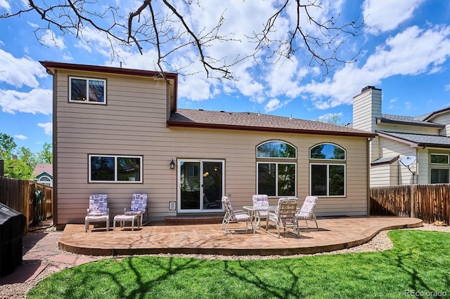 7354 S Robb St, Littleton, CO 80127 - back of property with a patio area