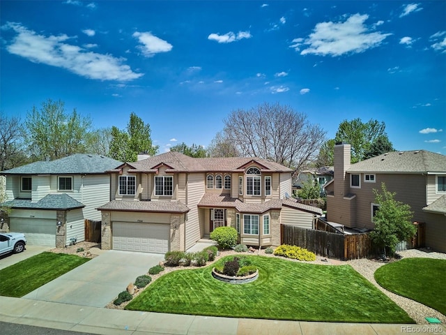 7354 S Robb St, Littleton, CO 80127 - view of front of property featuring an attached garage, driveway, brick siding, and a residential view