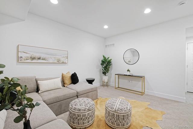 living room featuring baseboards, visible vents, recessed lighting, and carpet