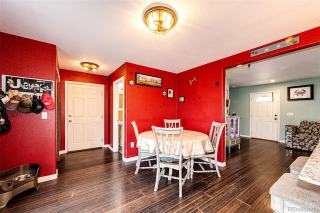 1824 Asoka St, Strasburg, CO 80136 - dining space with wood finished floors and baseboards