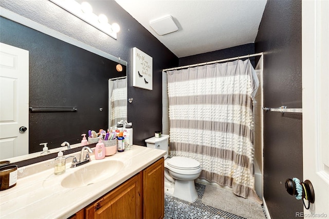 1824 Asoka St, Strasburg, CO 80136 - full bathroom featuring vanity, toilet, curtained shower, and a textured wall
