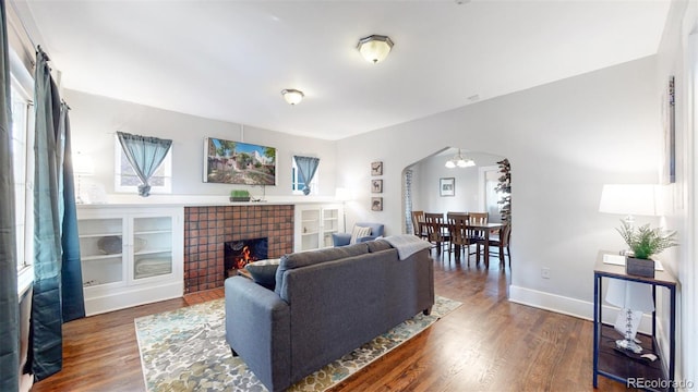 living room featuring dark hardwood / wood-style flooring