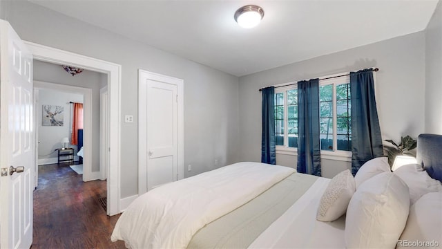 bedroom featuring dark hardwood / wood-style floors