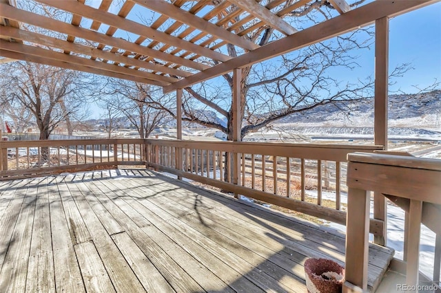 view of snow covered deck