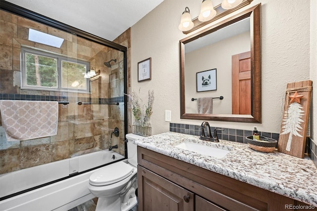 13540 Deer Ridge Way, Larkspur, CO 80118 - full bath with vanity, combined bath / shower with glass door, and a textured wall