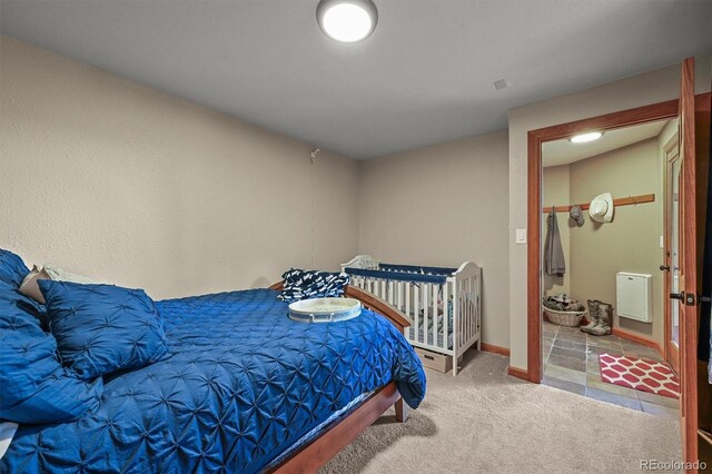 13540 Deer Ridge Way, Larkspur, CO 80118 - carpeted bedroom featuring baseboards