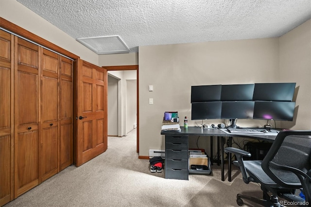 13540 Deer Ridge Way, Larkspur, CO 80118 - office area with light carpet, a textured ceiling, and attic access