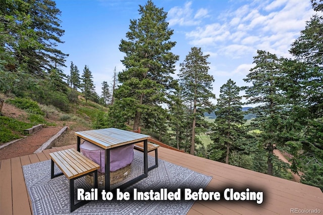13540 Deer Ridge Way, Larkspur, CO 80118 - deck featuring outdoor dining space