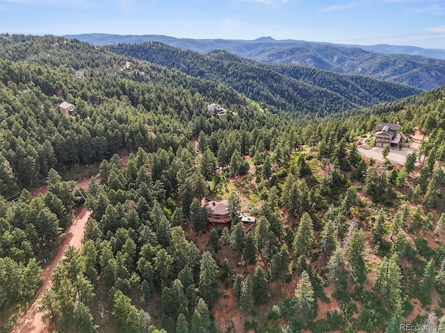 13540 Deer Ridge Way, Larkspur, CO 80118 - view of mountain backdrop with a heavily wooded area