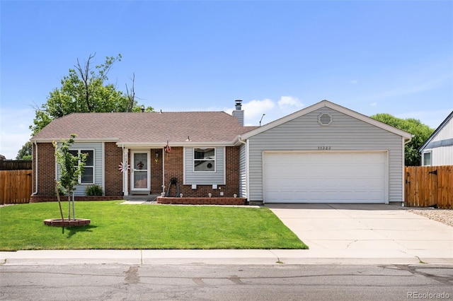 11323 Albion St, Thornton, CO 80233 - single story home with concrete driveway, a garage, brick siding, and a chimney