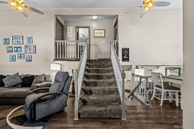 11323 Albion St, Thornton, CO 80233 - staircase featuring ceiling fan and wood finished floors