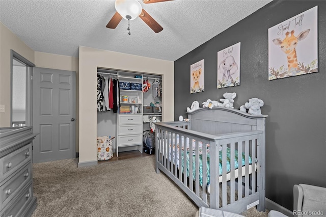 11323 Albion St, Thornton, CO 80233 - bedroom with carpet floors, a closet, a crib, a textured ceiling, and ceiling fan