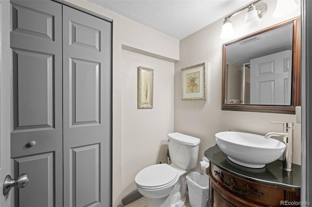 11323 Albion St, Thornton, CO 80233 - bathroom with vanity and toilet