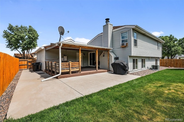 11323 Albion St, Thornton, CO 80233 - rear view of house featuring a patio, a chimney, a fenced backyard, and cooling unit