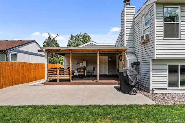 11323 Albion St, Thornton, CO 80233 - view of patio featuring grilling area, cooling unit, and a wooden deck