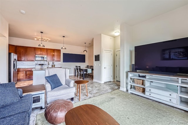 living room featuring baseboards