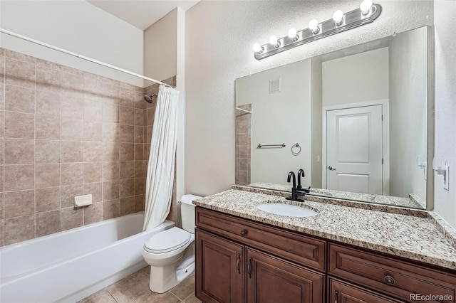 bathroom with shower / bath combo, visible vents, toilet, tile patterned floors, and vanity