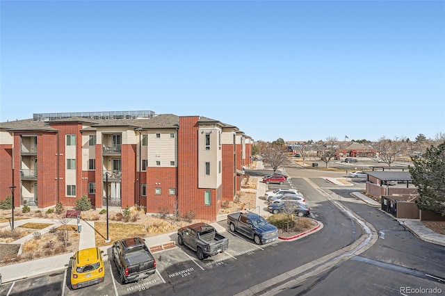 exterior space with sidewalks and curbs