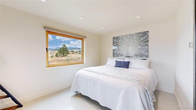 bedroom with light colored carpet