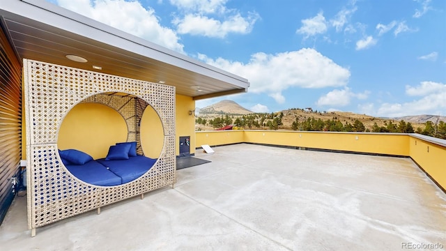 view of patio featuring a mountain view