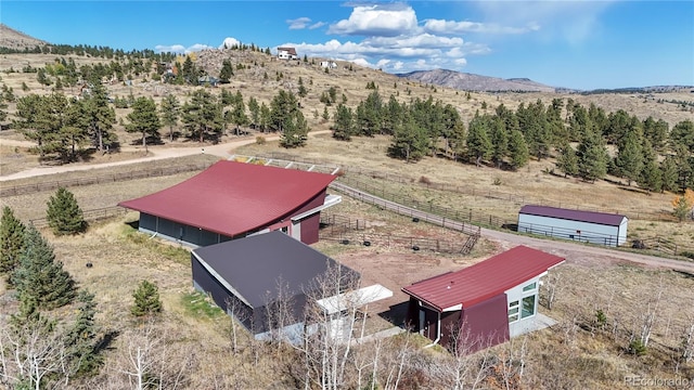 bird's eye view with a mountain view and a rural view