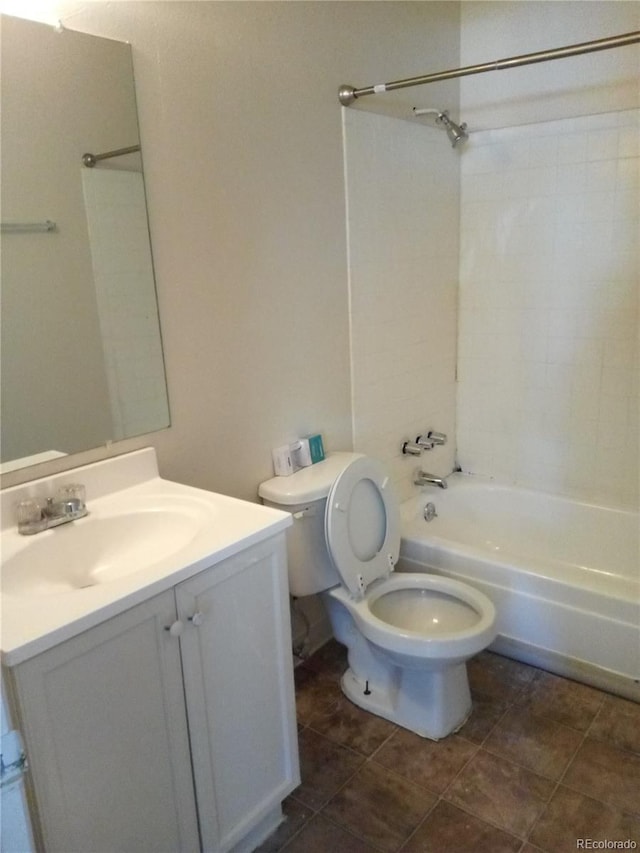 full bathroom featuring bathtub / shower combination, vanity, toilet, and tile patterned flooring