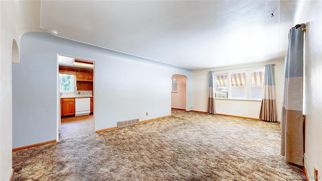 4420 Teller St, Wheat Ridge, CO 80033 - spare room featuring arched walkways and carpet floors