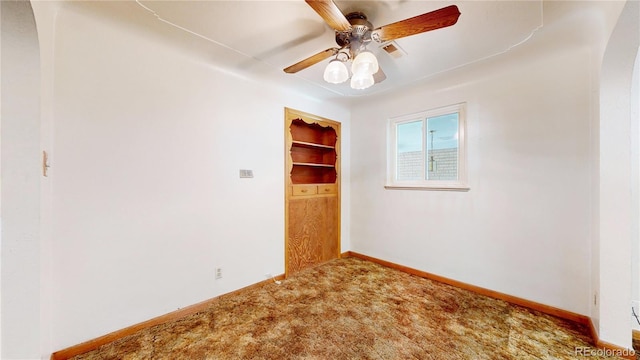 4420 Teller St, Wheat Ridge, CO 80033 - carpeted empty room with a ceiling fan and arched walkways