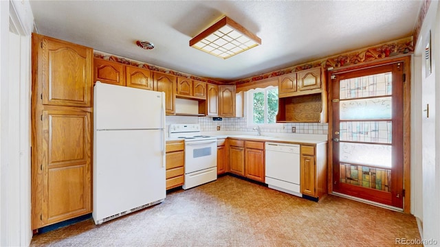 4420 Teller St, Wheat Ridge, CO 80033 - kitchen featuring white appliances, light countertops, backsplash, and open shelves