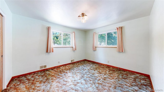 4420 Teller St, Wheat Ridge, CO 80033 - spare room with healthy amount of natural light and carpet