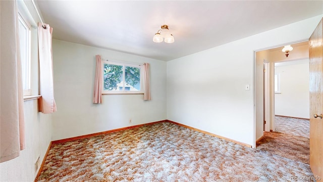 4420 Teller St, Wheat Ridge, CO 80033 - carpeted empty room featuring baseboards