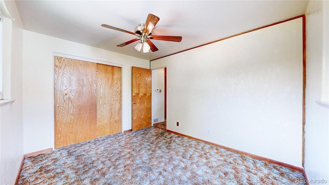 4420 Teller St, Wheat Ridge, CO 80033 - unfurnished bedroom featuring a closet, carpet floors, and a ceiling fan