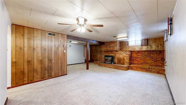 4420 Teller St, Wheat Ridge, CO 80033 - below grade area featuring wooden walls, carpet floors, and ceiling fan