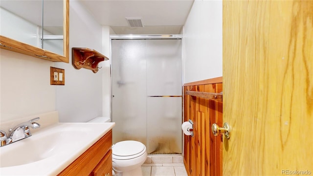 4420 Teller St, Wheat Ridge, CO 80033 - full bath with a shower stall, vanity, and tile patterned flooring
