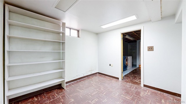 4420 Teller St, Wheat Ridge, CO 80033 - spare room with a wood stove and washer / dryer
