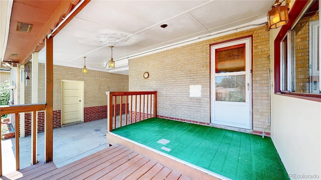 4420 Teller St, Wheat Ridge, CO 80033 - view of wooden porch