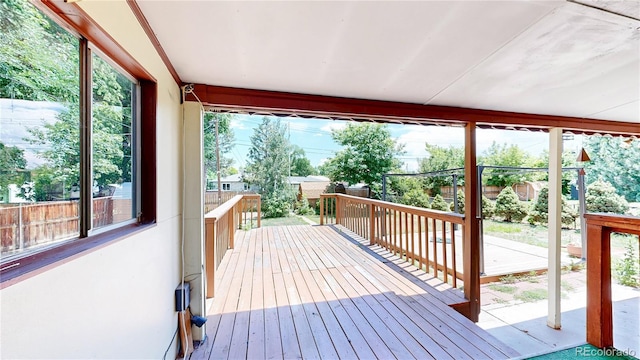 4420 Teller St, Wheat Ridge, CO 80033 - wooden terrace featuring a storage shed