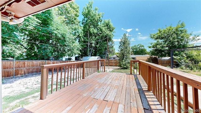 4420 Teller St, Wheat Ridge, CO 80033 - wooden terrace featuring a fenced backyard and an outbuilding