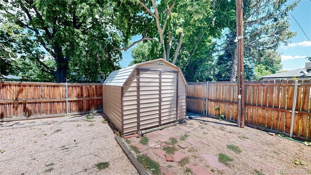 4420 Teller St, Wheat Ridge, CO 80033 - view of shed with a fenced backyard
