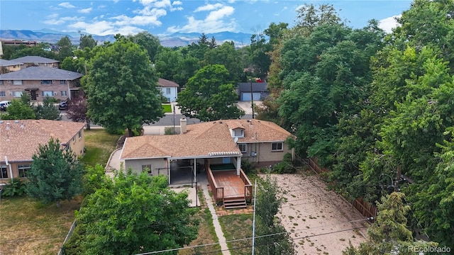 4420 Teller St, Wheat Ridge, CO 80033 - aerial perspective of suburban area with mountains