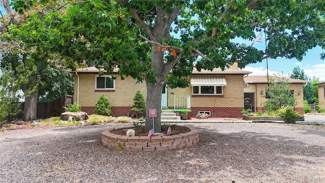 4420 Teller St, Wheat Ridge, CO 80033 - view of front of home with brick siding